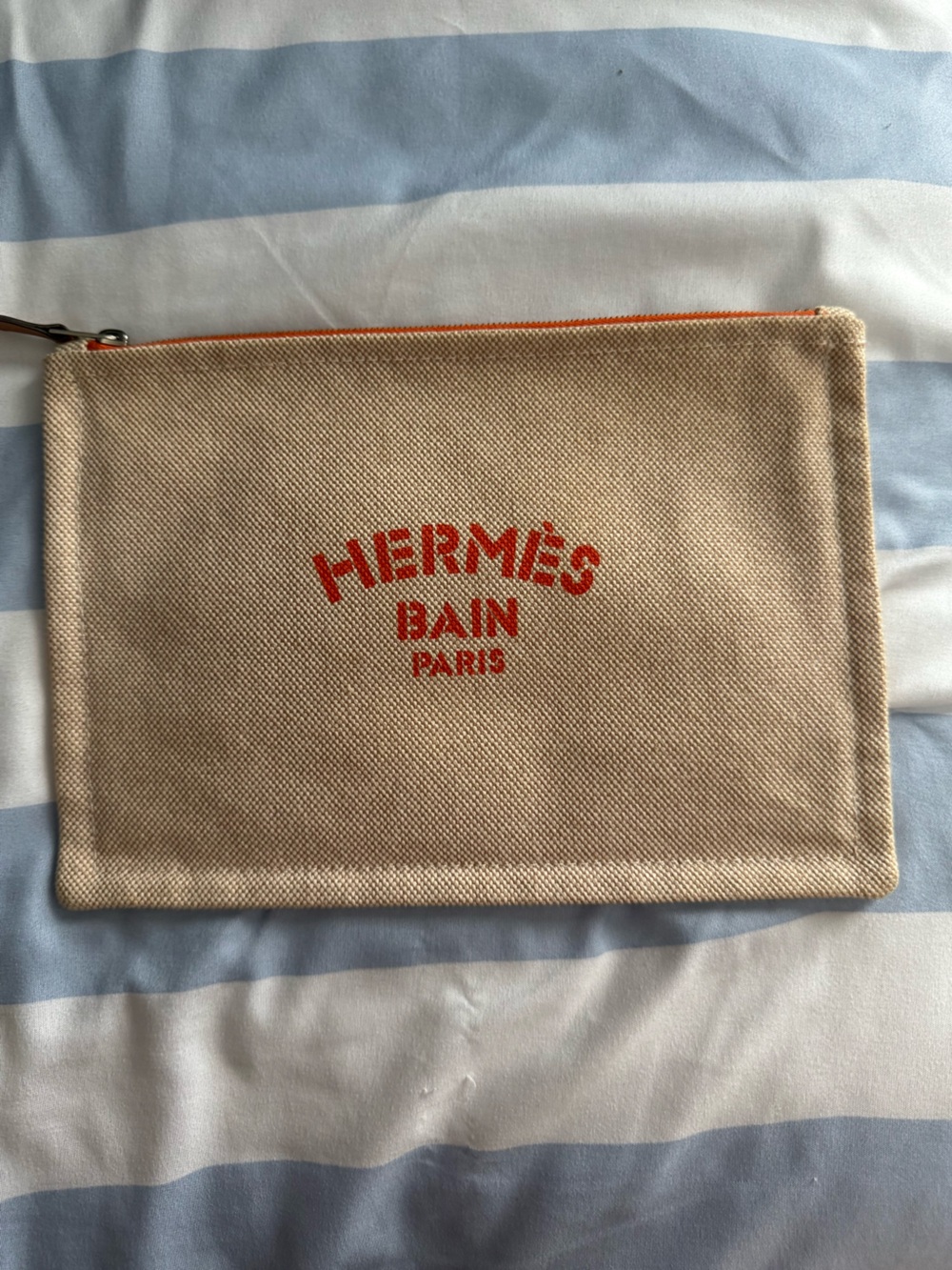 Hermes Beige Canvas Pouch with Orange Trim and Red Logo